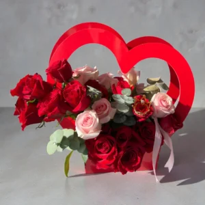 Crimson Heart Valentine rose basket displayed in lifestyle setting