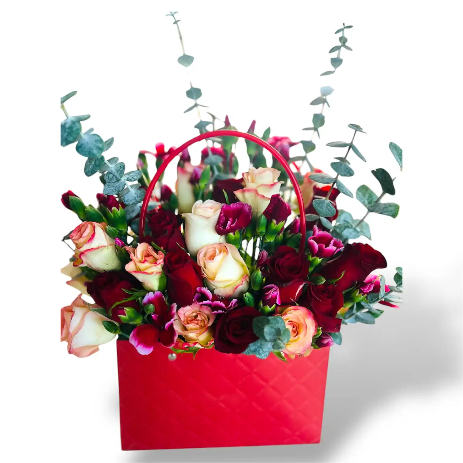 Red rose floral arrangement in a ruby red box with eucalyptus greenery