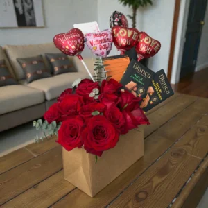 Valentine rose and chocolate box displayed in home setting